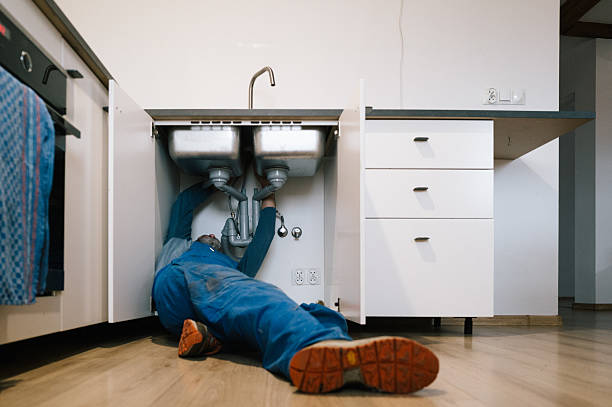 Professional Drain Cleaning technician working in Candia, NH